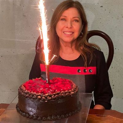 The picture shows Francisca Munoz smiling with her birthday cake.